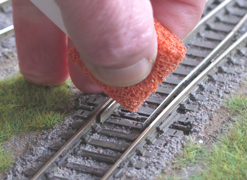 do not squeeze Track Magic out of the foam applicator pad.