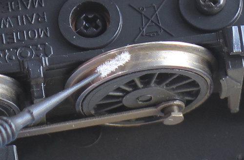 micro brush to carefully clean the locomotive wheel .